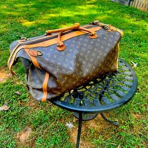 Louis Vuitton carry on bag.